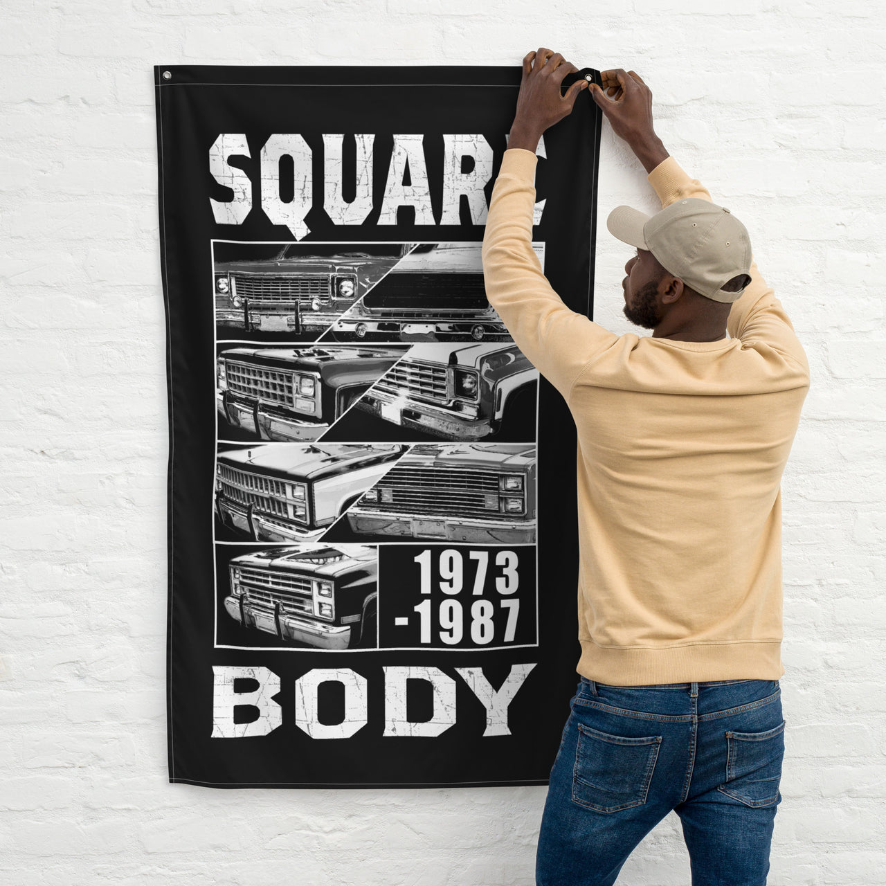 man hanging Square Body Truck Flag