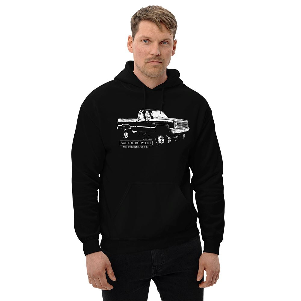 Man wearing a K10 Square Body Hoodie in Black From Aggressive Thread