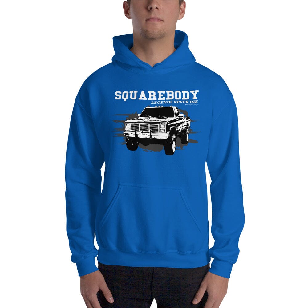 Man Posing in Square Body Hoodie Legends Never Die From Aggressive Thread - Color Blue