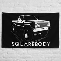 Thumbnail for Square Body Lifted 80s Flag Truck hung on brick wall