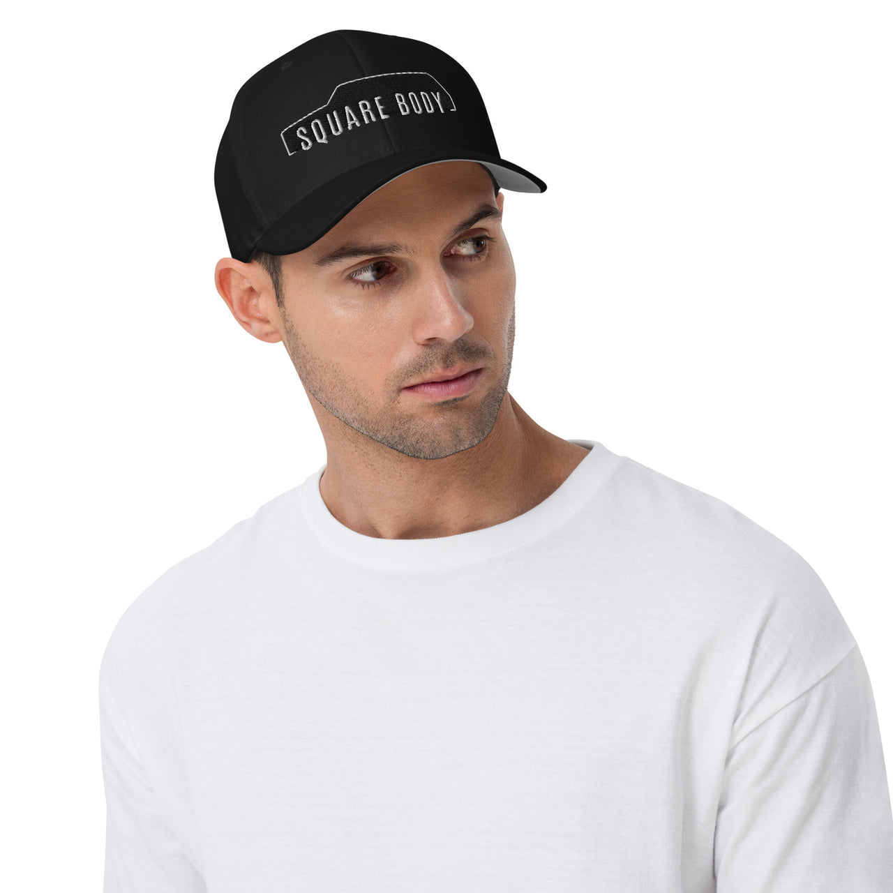 Man Wearing a Square Body Suburban Hat From Aggressive Thread in Black