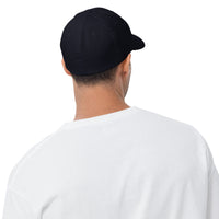 Thumbnail for back of man wearing navy hat and white long sleeve shirt