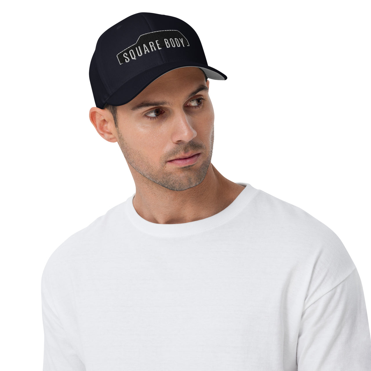 Man Wearing a Square Body Suburban Hat From Aggressive Thread in Navy