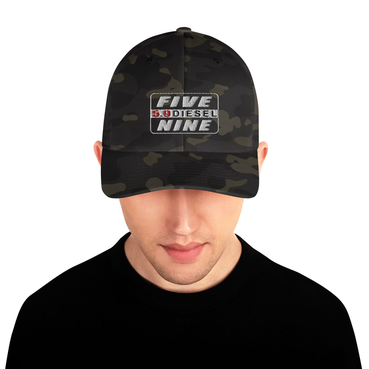 Man wearing a 5.9 Cummins hat in black