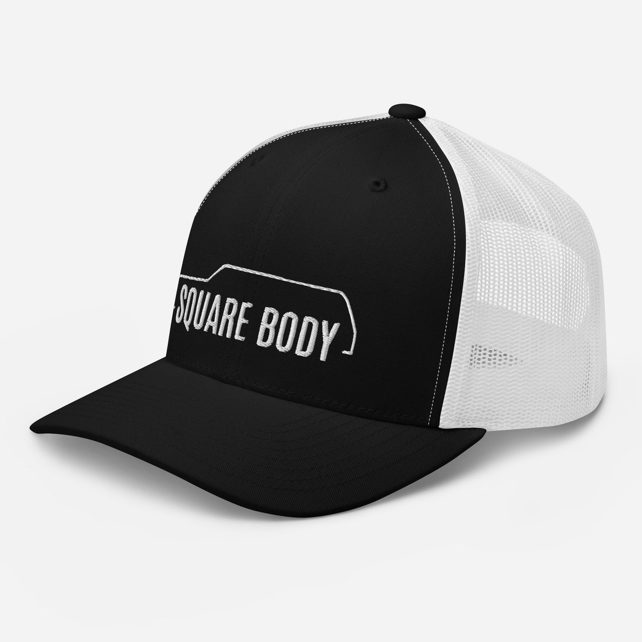 3/4 view of a square body suburban trucker hat from aggressive thread in black and white