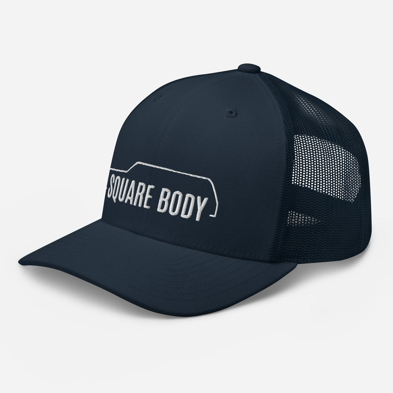 3/4 view of a square body suburban trucker hat from aggressive thread in navy
