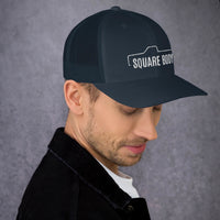 Thumbnail for man wearing a Square body c10 k10 trucker hat from aggressive thread in navy